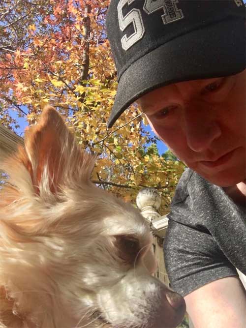 A picture of Dan Donohue with his dog.